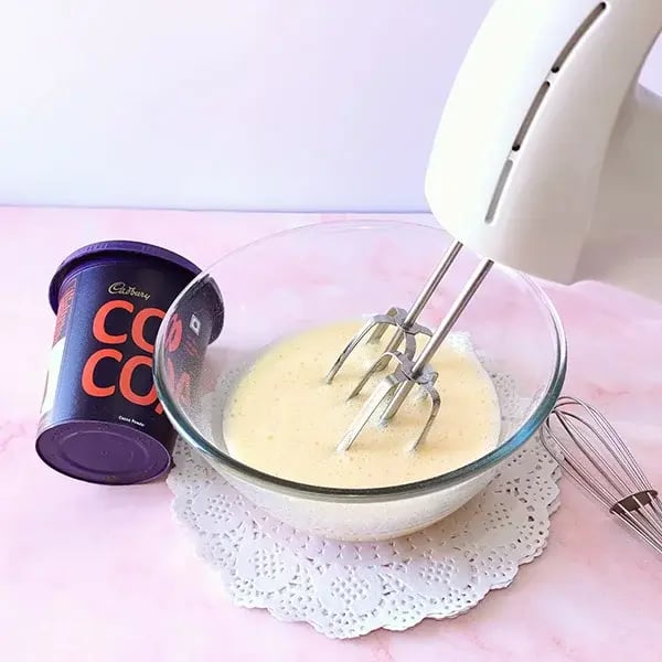 Vanilla Dairy Milk Sponge Cake - Beat the eggs