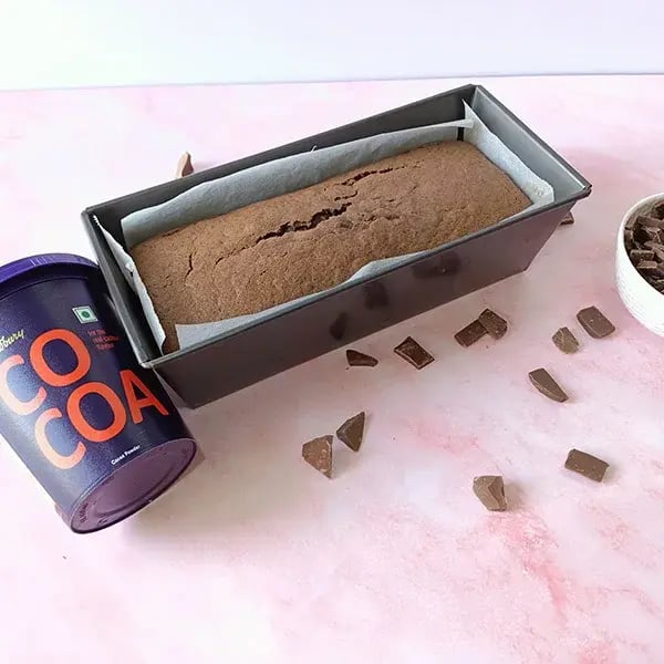 Vanilla Dairy Milk Sponge Cake - Pour it into a loaf pan