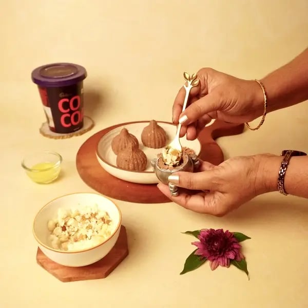 Vinayaka Chavithi Special Cocoa Paneer Modak - Adding Modak Filling