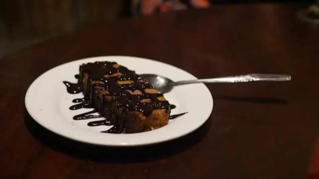 Sticky Pecan Bars with Melted Silk Chocolate Glaze