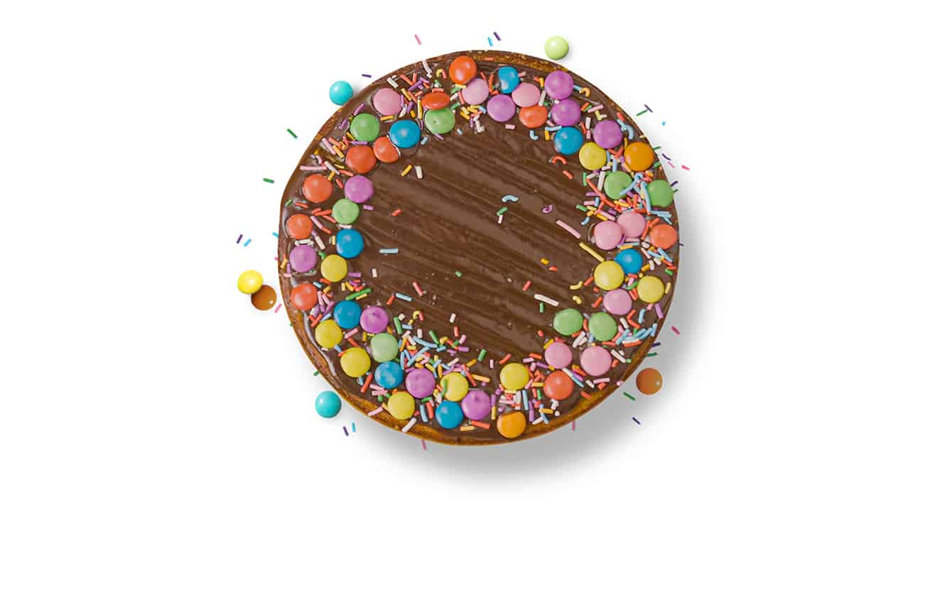 Gems and Caramello <br> Loaded Cake